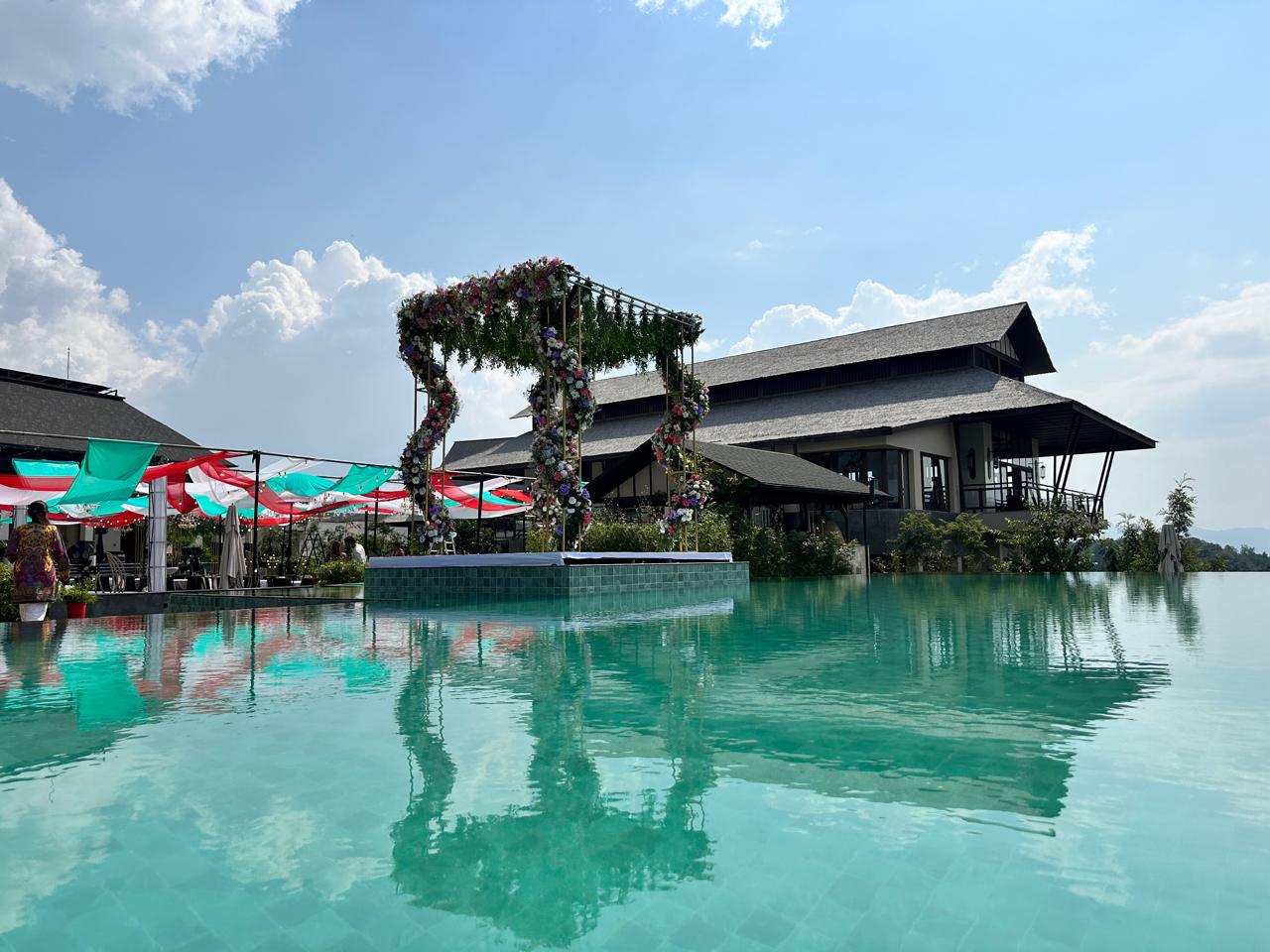 Destination wedding mandap over an infinity pool planned by Kathmandu Wedding in Nepal